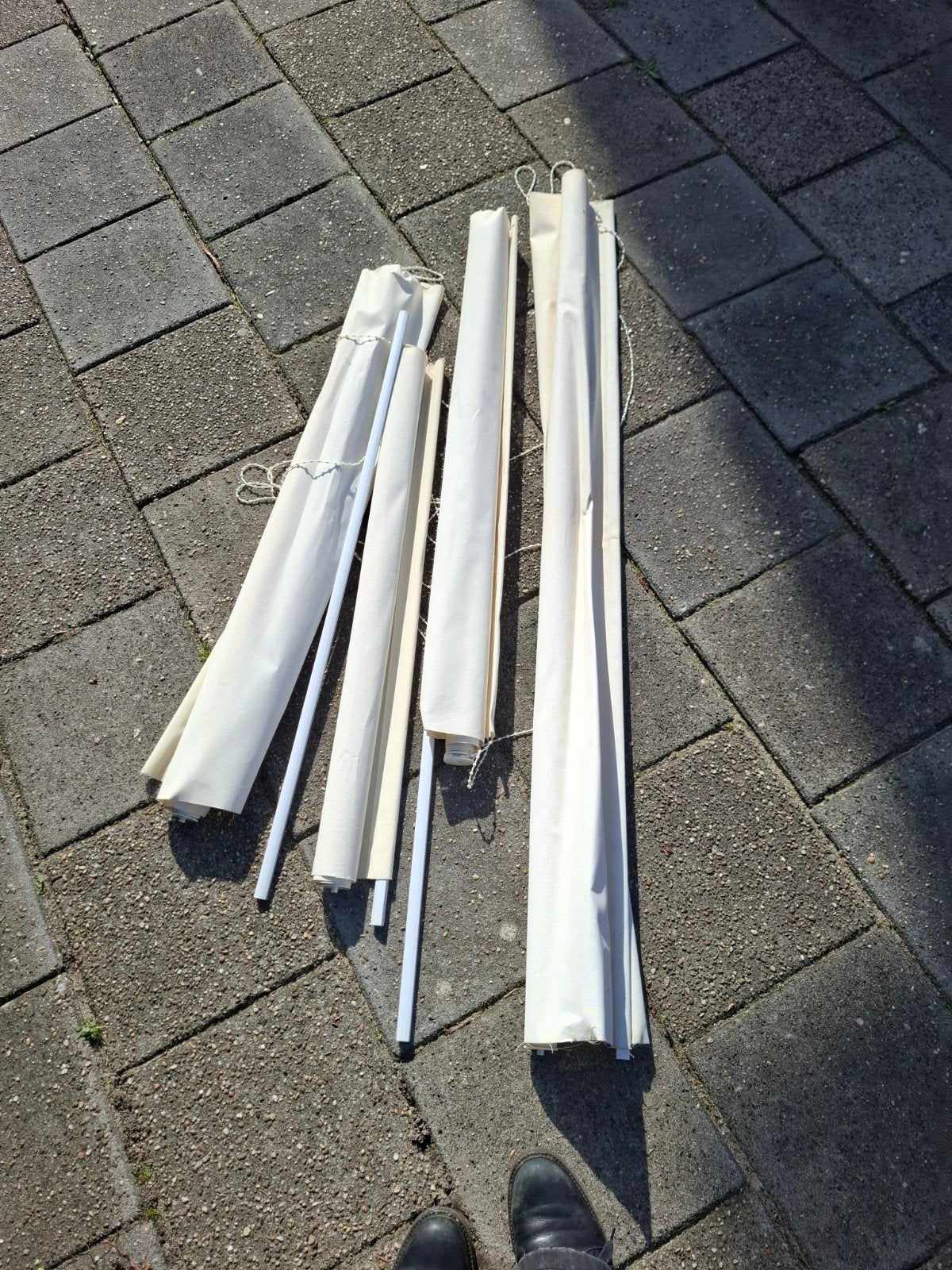 rolgordijn creme, Ophalen