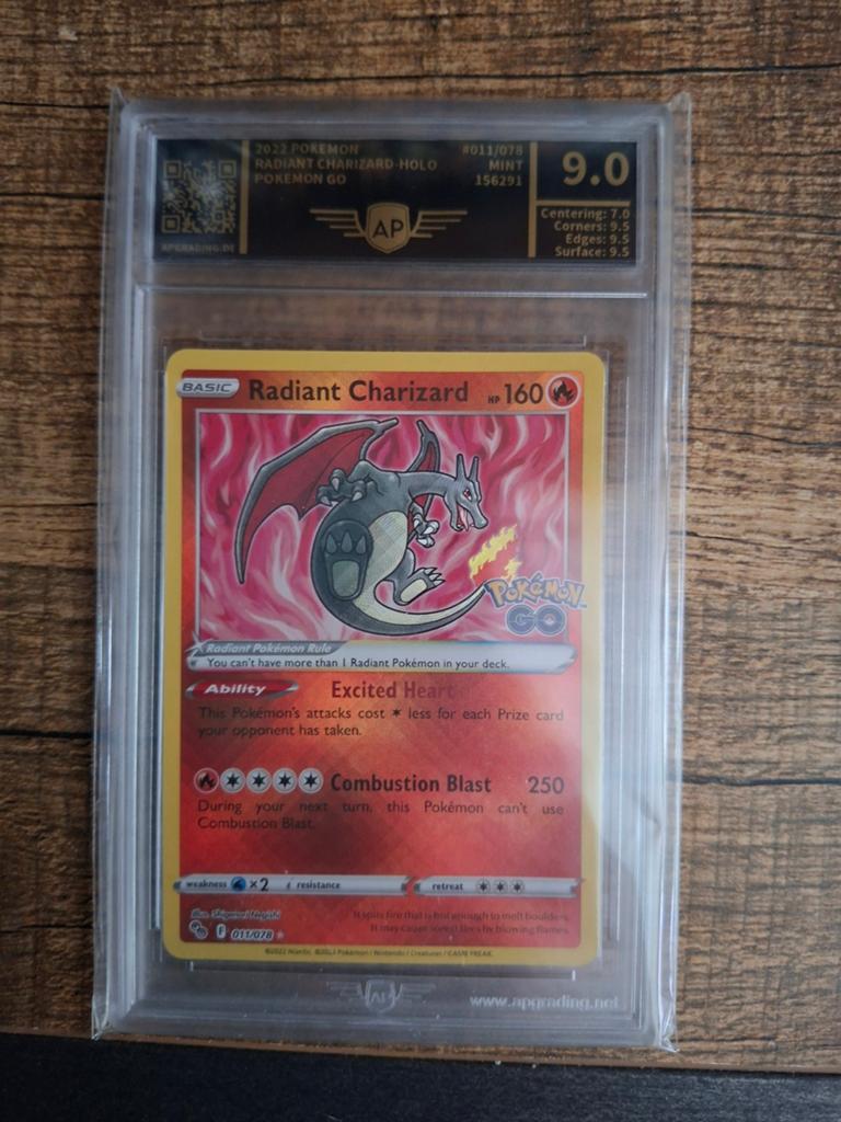 Radiant Charizard Pokemon Go AP Grading 9, Hobby en Vrije tijd, Verzamelkaartspellen | Pokémon, Ophalen of Verzenden, Nieuw, Losse kaart