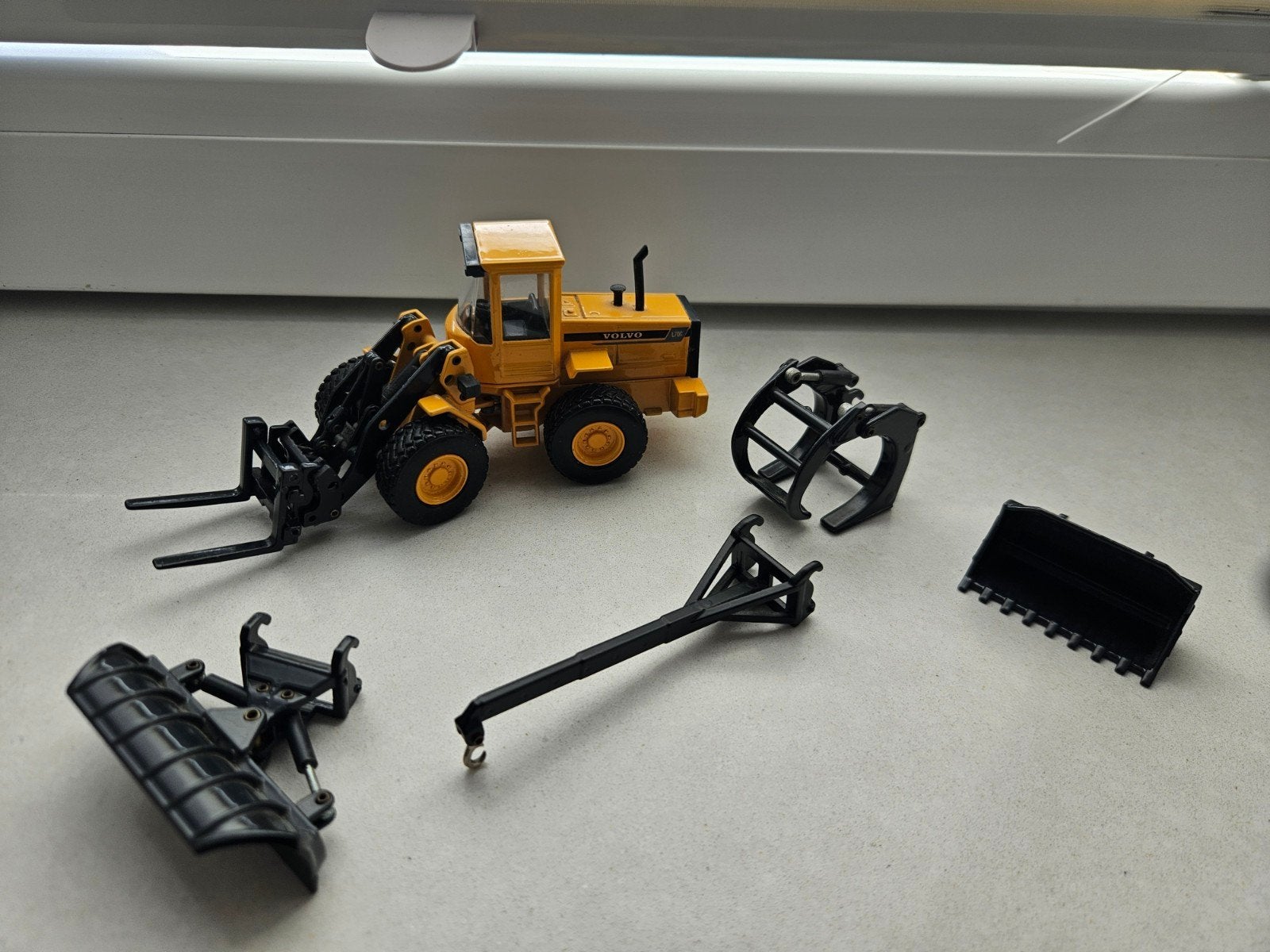 Joal Volvo BM L70C Wiellader met accessoires, Ophalen of Verzenden, Gebruikt, Overige typen