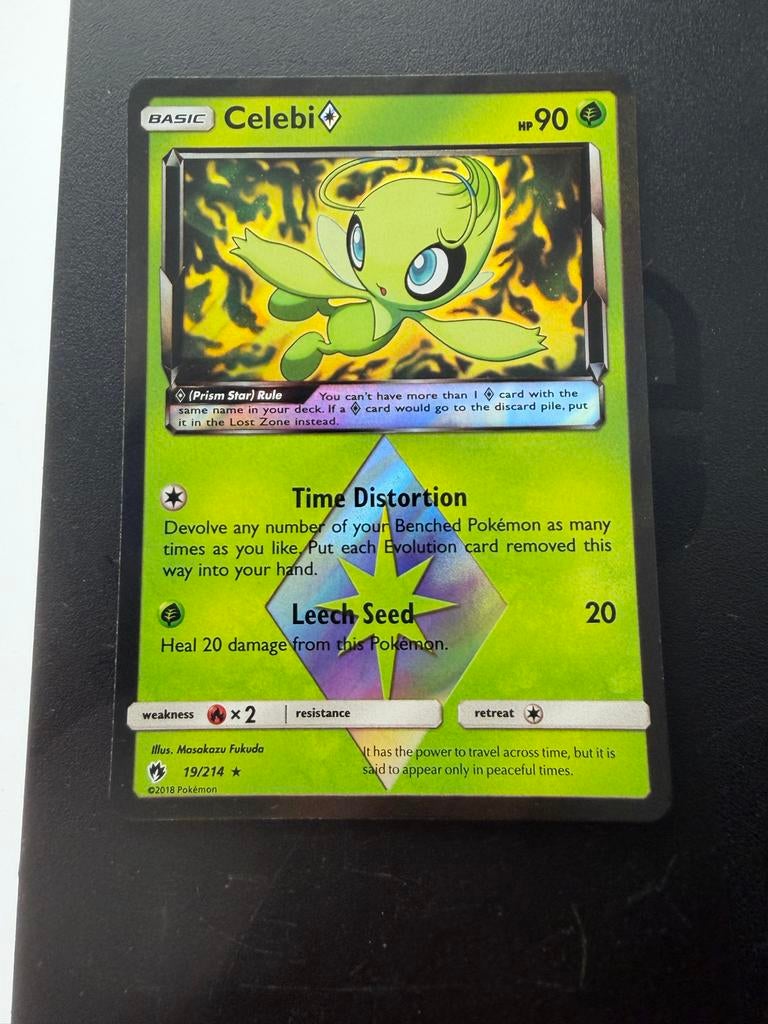 Celebi (PST) 19/214 - Pokémon Kaart, Ophalen of Verzenden, Zo goed als nieuw, Losse kaart