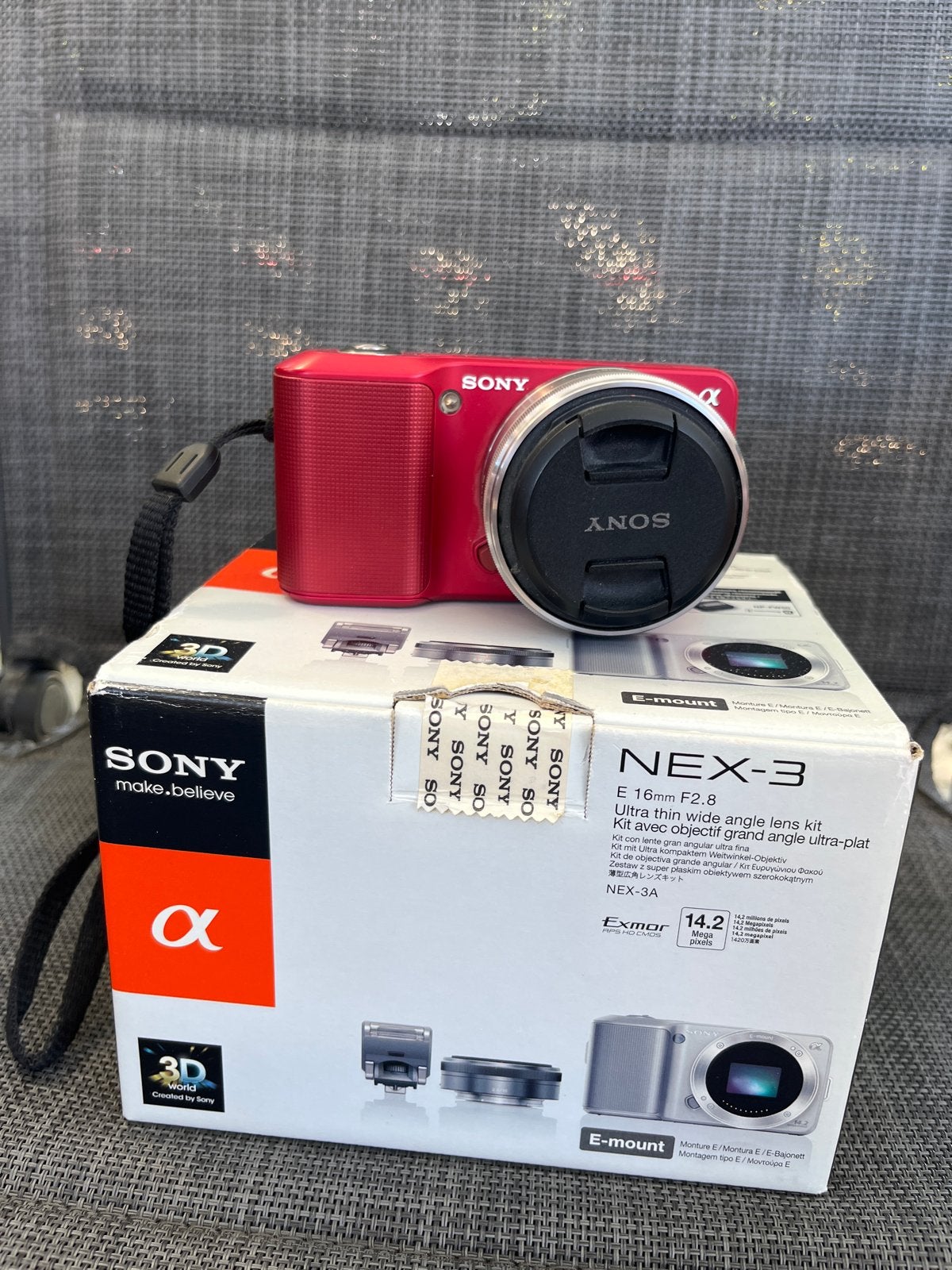 Sony NEX-3 Systeemcamera met E 16mm F2.8 lens (Rood), Audio, Tv en Foto, Fotocamera's Digitaal, Ophalen of Verzenden, Zo goed als nieuw