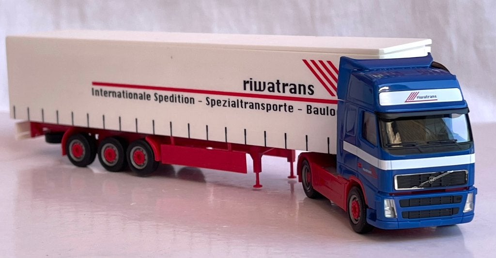 Herpa 150880: Volvo FH Globetrotter XL "riwatrans", Hobby en Vrije tijd, Modelauto's | 1:87, Ophalen of Verzenden, Zo goed als nieuw