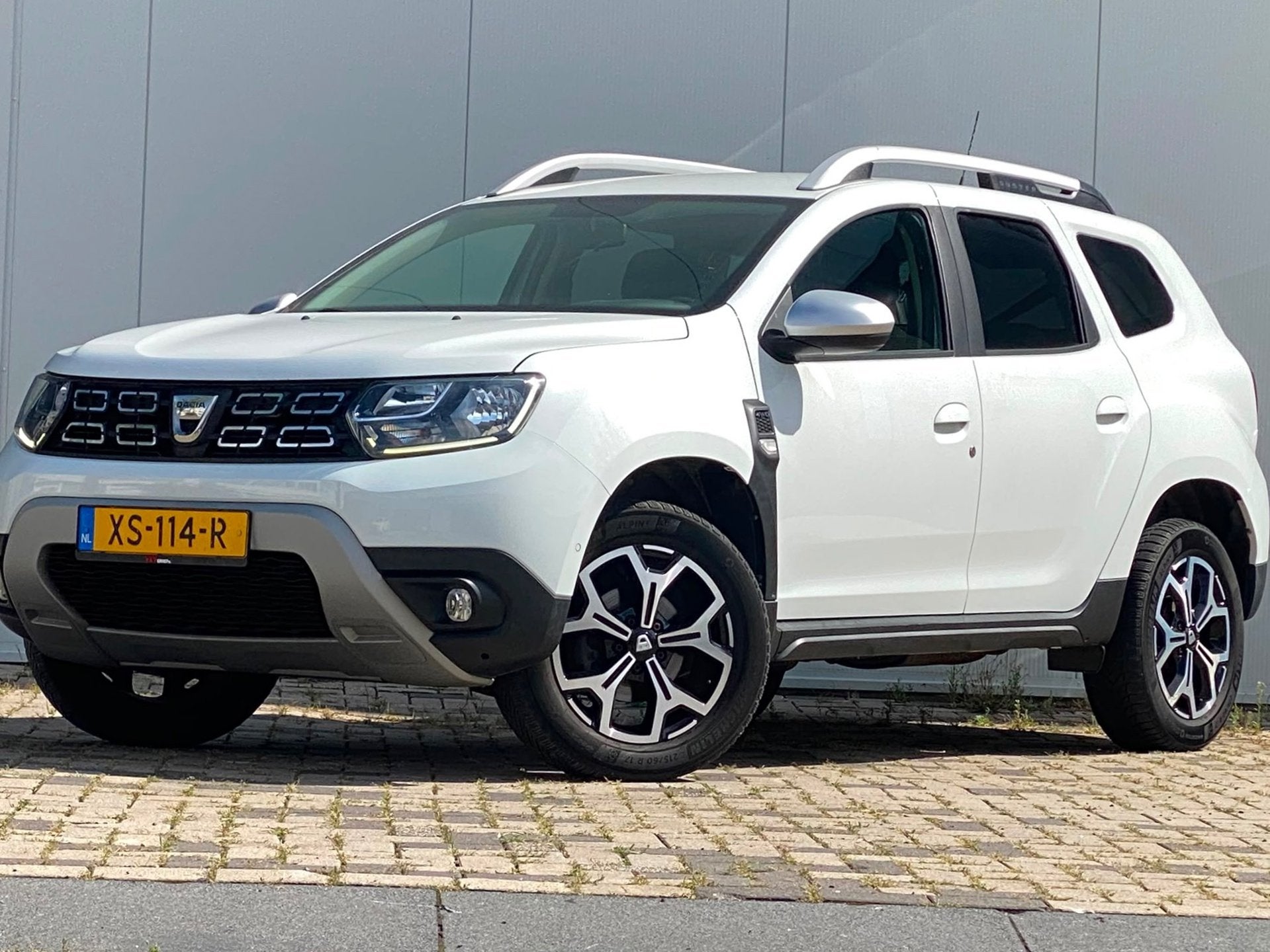 Dacia Duster 1.6 SCe Prestige 4WD AIRCO NAVI CAMERA NAP DEAL, Auto's, Voorwielaandrijving, Dealer onderhouden, Gebruikt, Euro 6