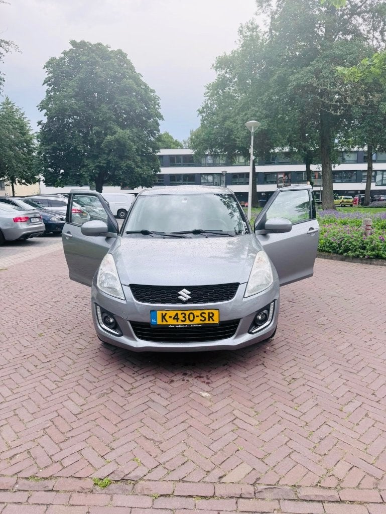 Suzuki 2014 Grijs, Voorwielaandrijving, 94 pk, Stof, 4 cilinders