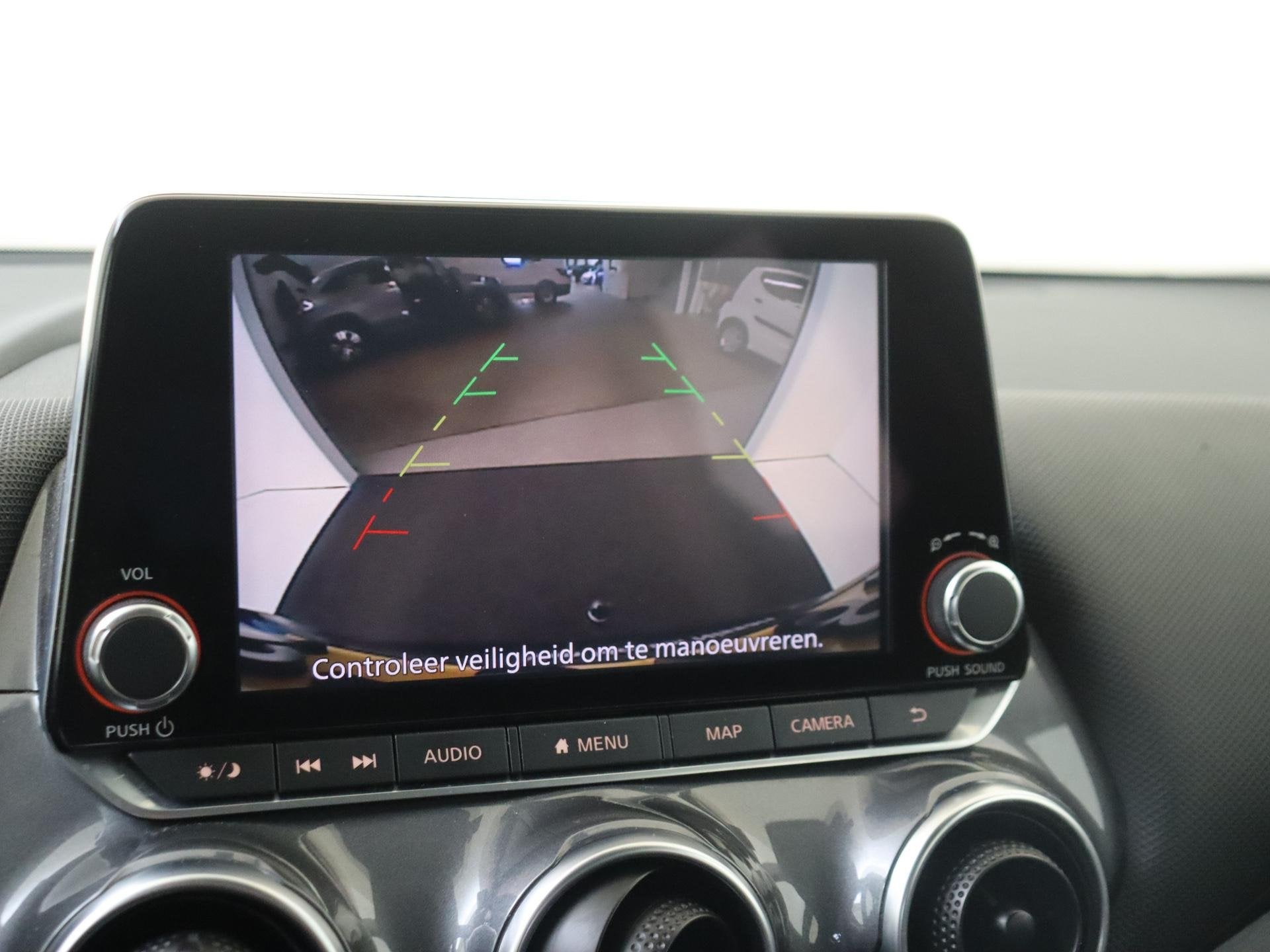 Foto 22 van Nissan Juke 1.0 DIG-T Acenta | Achteruitrijcamera | Wieldopp