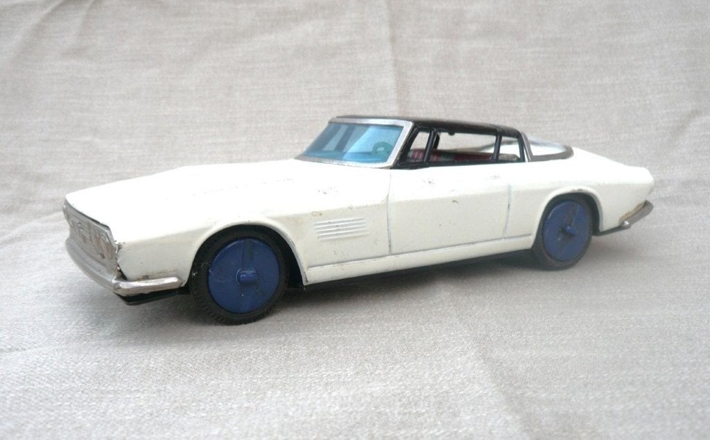 Taiyo Japan Ford mustang met Bertone carrosserie 1965. blik., Antiek en Kunst, Antiek | Speelgoed, Ophalen of Verzenden