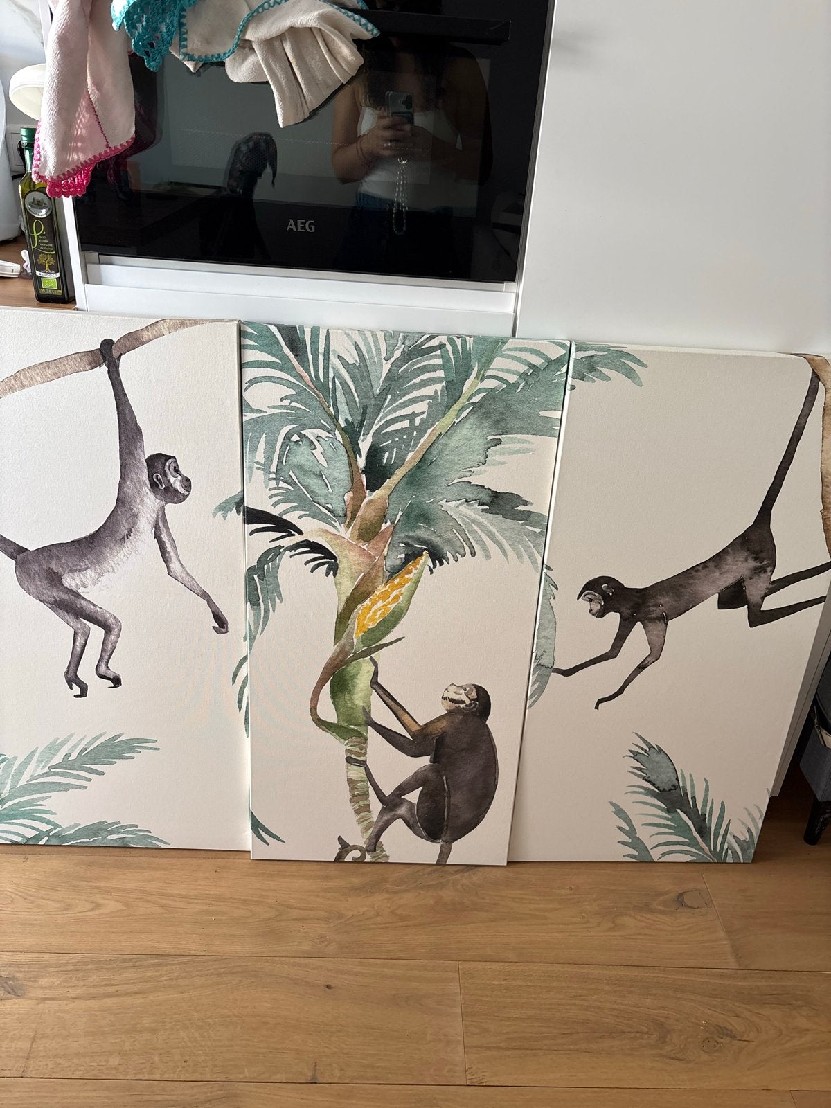 Set van 3 schilderijen met apen en palmbomen, Ophalen