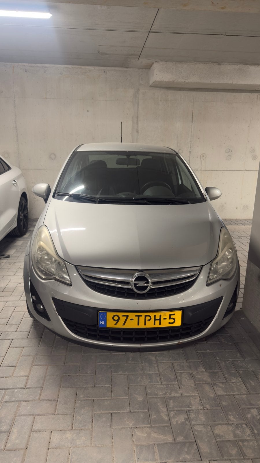 Opel Corsa 1.2 16V 5D 2012 Grijs, Auto's, Voorwielaandrijving, 1063 kg, Zwart, 4 cilinders