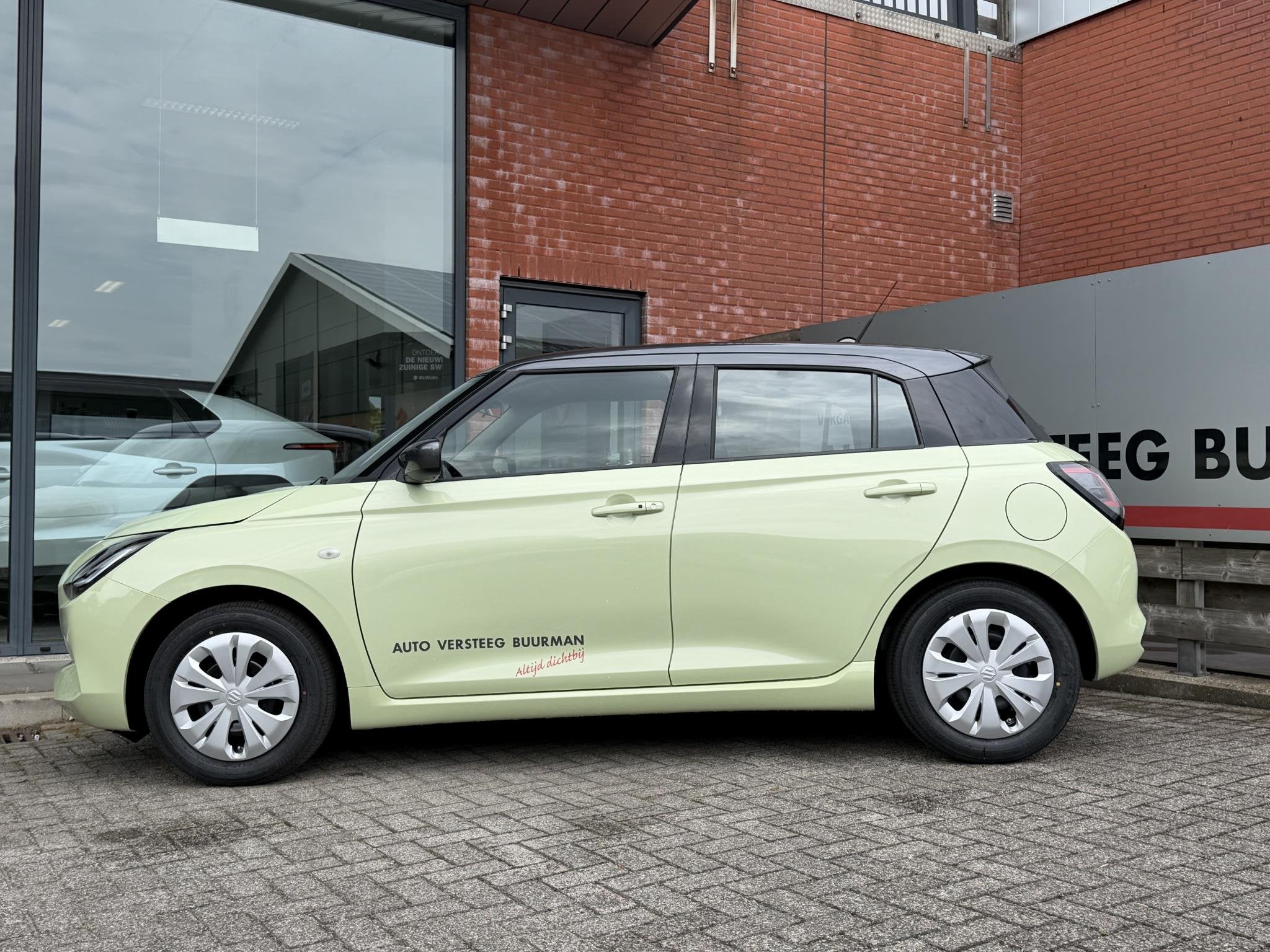 Suzuki Swift 1.2 Comfort Smart Hybrid DEMO DEAL, Achteruitri, Auto's, Suzuki, Voorwielaandrijving, 12 maanden, Stof, Euro 6