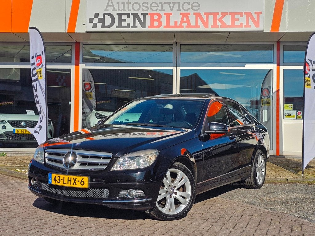 Mercedes-Benz C-klasse 180 K BlueEFFICIENCY Bns Edition Avan, Auto's, Mercedes-Benz, Gebruikt, Leder en Stof, Zwart, Handgeschakeld