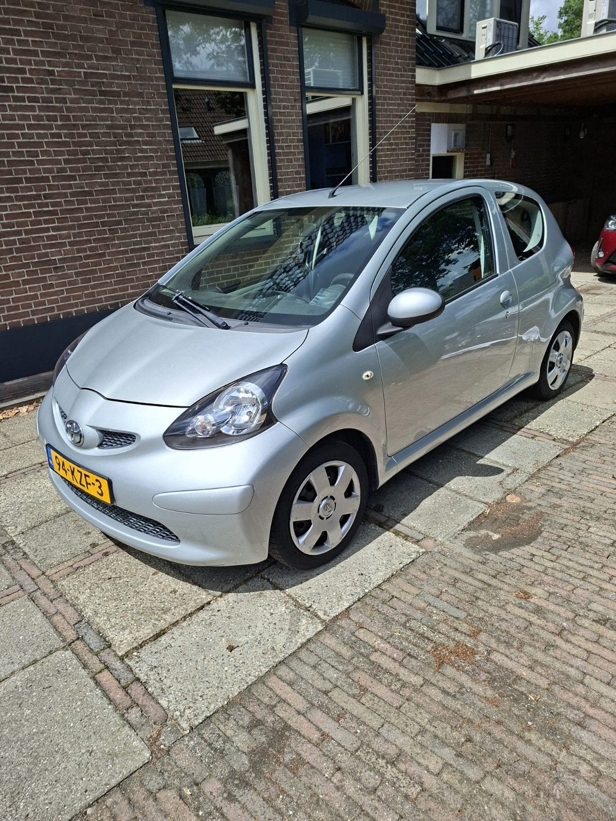 Toyota Aygo 1.0 12V Vvt-i 3DRS MMT 2007 Grijs, Auto's, Toyota, Voorwielaandrijving, Stof, 4 stoelen, 68 pk