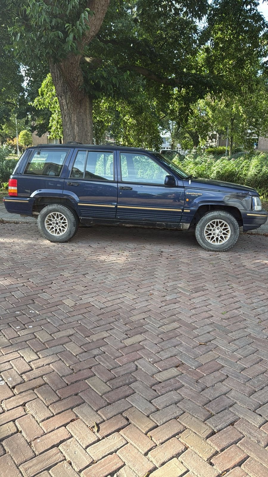 Jeep Grand Cherokee 5.2 I V8 MPI Limited AUT 4WD U9 1994, Auto's, Automaat, 5216 cc, 8 cilinders, Blauw