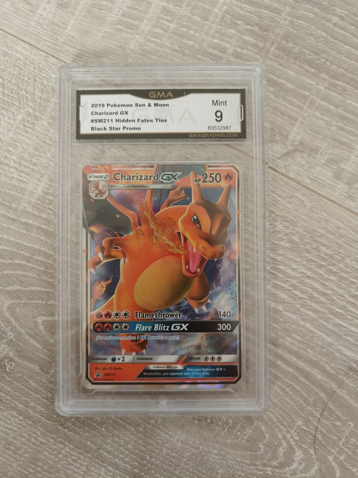 Charizard GX SM211 Black Star Promo, Ophalen of Verzenden, Zo goed als nieuw, Losse kaart