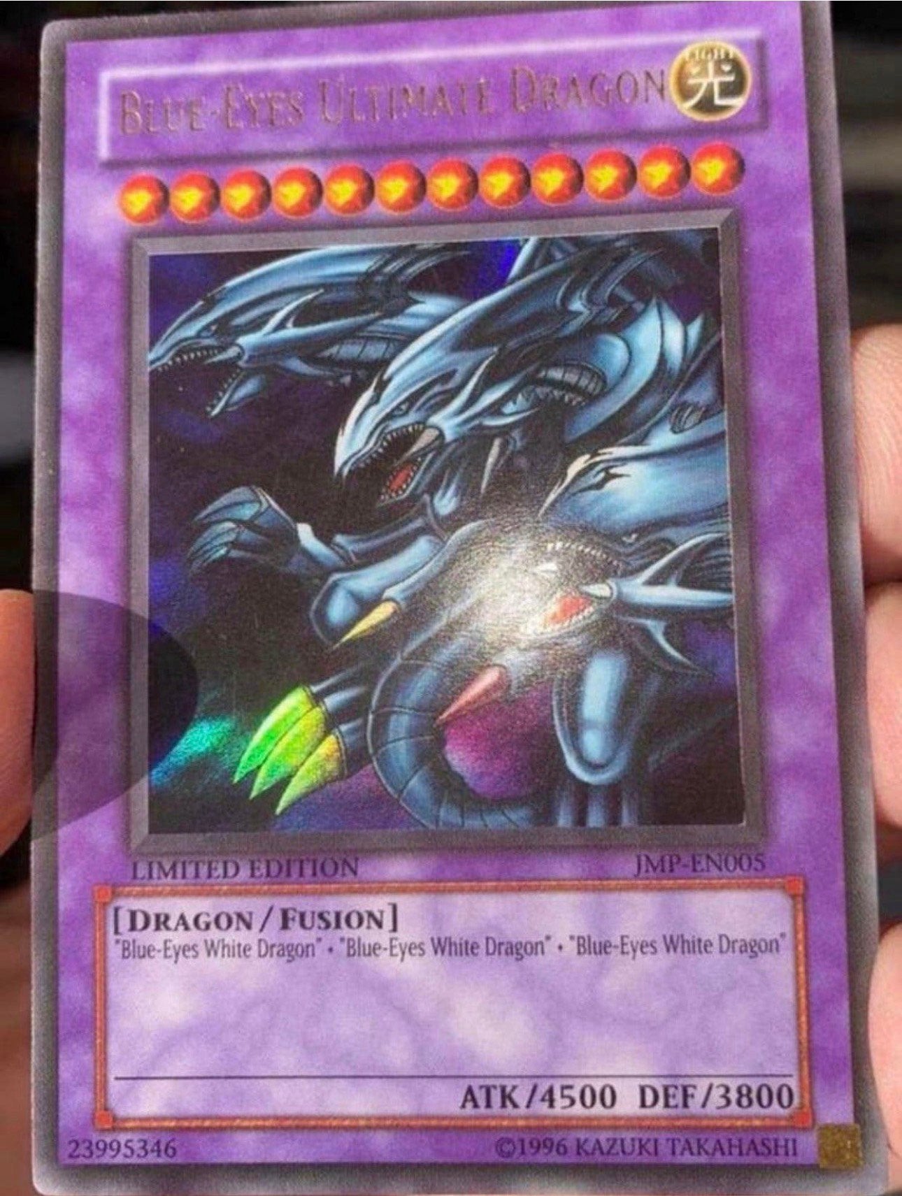 Yu-Gi-Oh! Blue Eyes Ultimate Dragon JMP Old Jump Promo !, Hobby en Vrije tijd, Ophalen of Verzenden, Gebruikt, Losse kaart, Foil