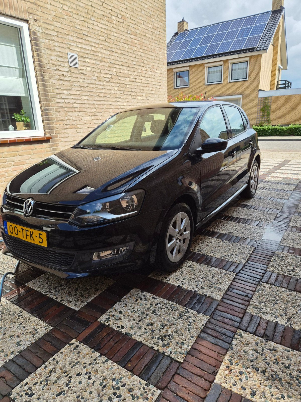 Volkswagen Polo 1.2 TSI 66KW 2012 Zwart, Auto's, Voorwielaandrijving, Stof, 40 €/maand, 4 cilinders