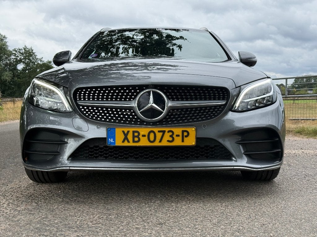 Mercedes-Benz C-Klasse C180 9G-TRONIC AMG pakket, Auto's, Automaat, Achterwielaandrijving, 1800 kg, Euro 6