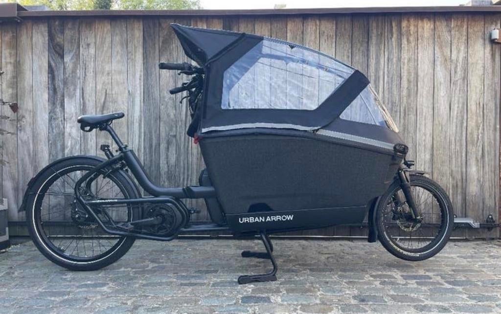 Gezocht zwarte Urban Arrow/Lovens bakfiets met regenkap, Fietsen en Brommers, Fietsen | Bakfietsen, Huif, Zo goed als nieuw, 2 kinderen