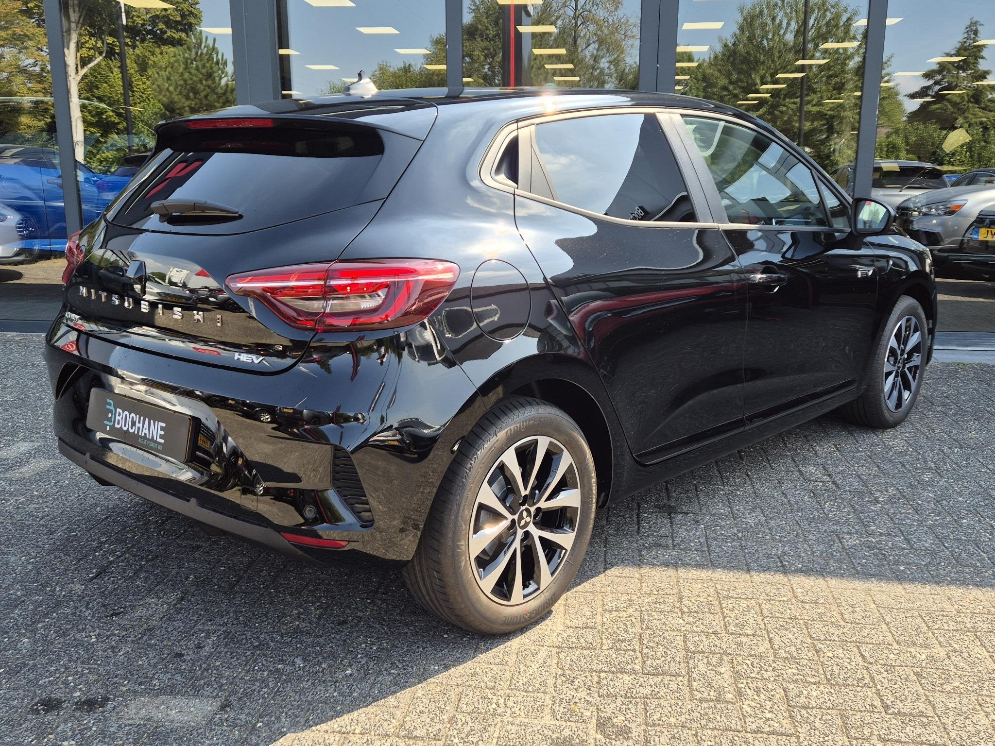Mitsubishi Colt 1.6 HEV Intense | Demo | Apple CarPlay / And, Auto's, Stof, Met garantie (alle), Bedrijf, Hybride Elektrisch/Benzine