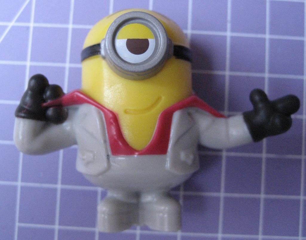 Minion poppetje in grijs pak., Ophalen of Verzenden, Zo goed als nieuw