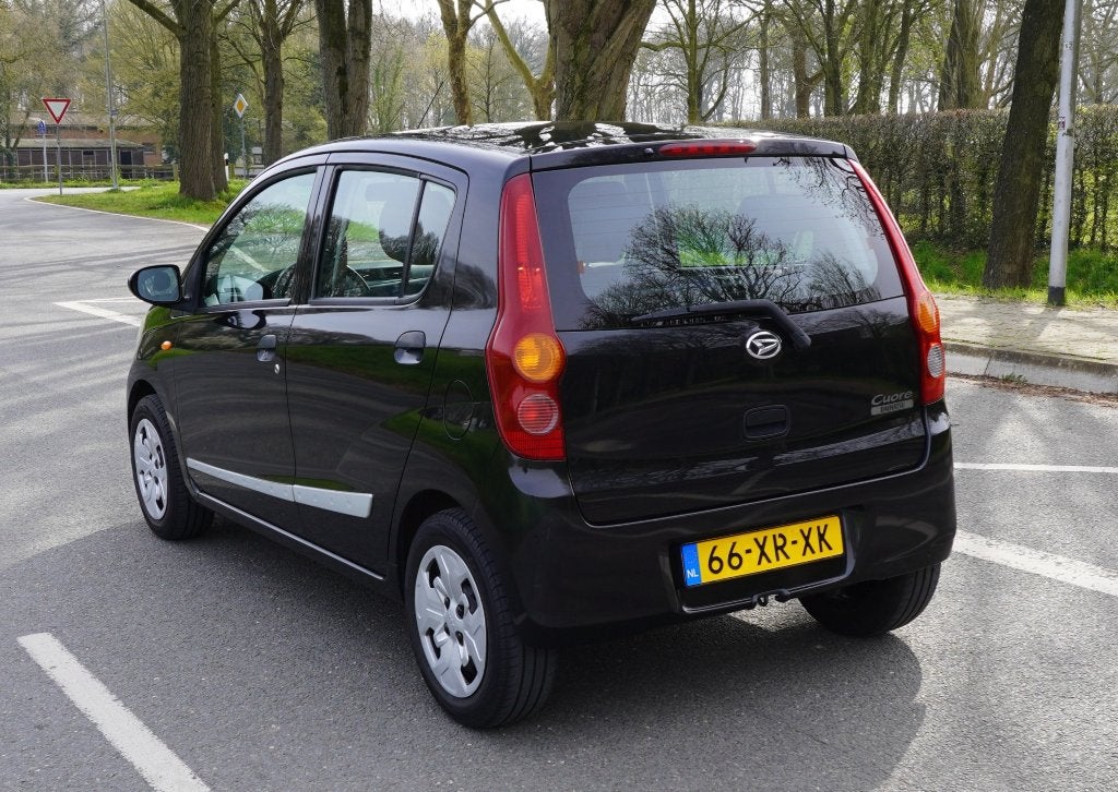 Daihatsu Cuore 1.0-12V Premium, 2007, stuurbekr, apk 04-'27, Voorwielaandrijving, Stof, 600 kg, 18 €/maand