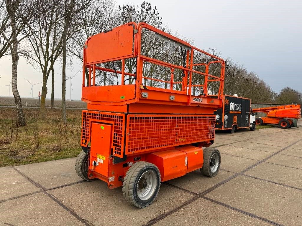 JLG 4069 LE schaar hoogwerker 14m accu (bj 2015), Zakelijke goederen, Machines en Bouw | Liften, Steigers en Ladders