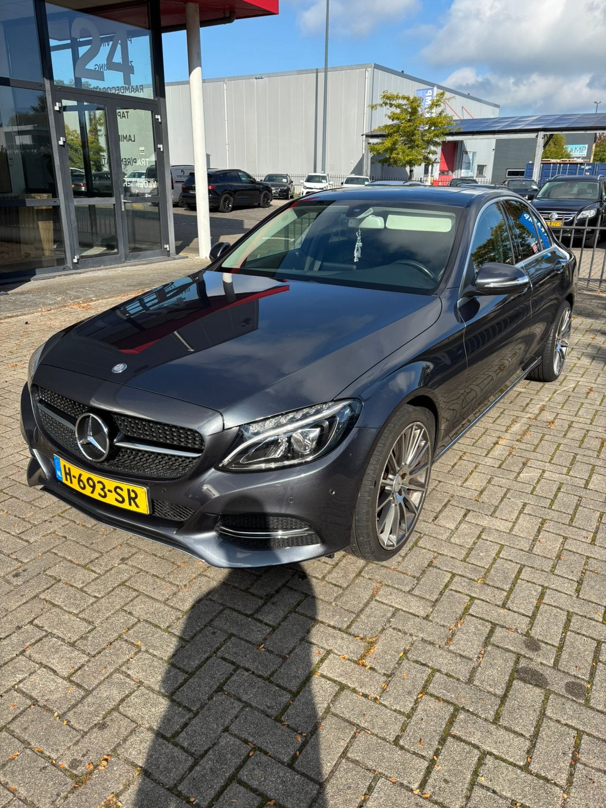 Mercedes-Benz C-Klasse C180 1.6 115KW Aut7 2015 Grijs, Auto's, Automaat, 1800 kg, Zwart, Leder en Stof