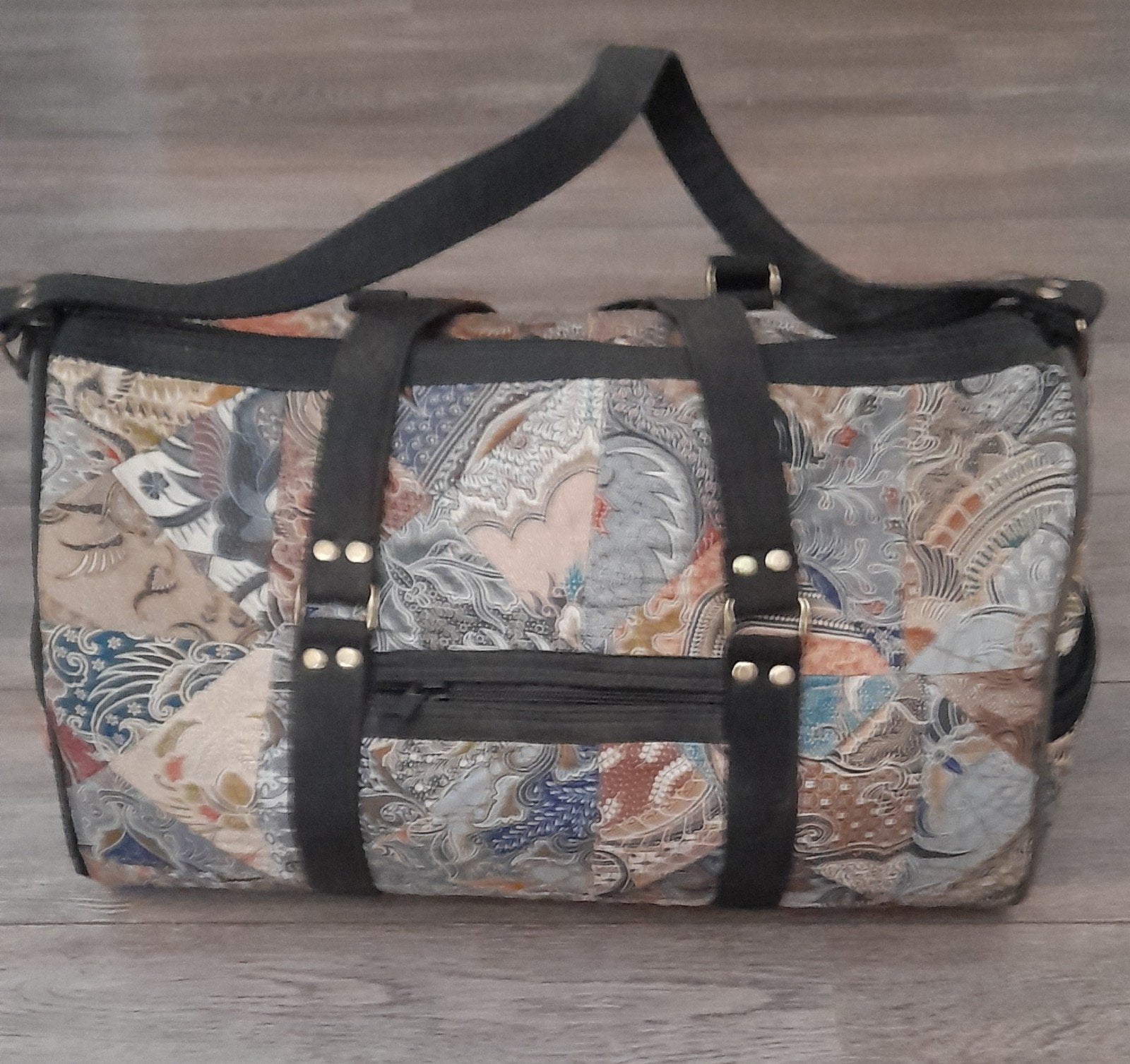 Reistas met uniek patchwork design, Ophalen