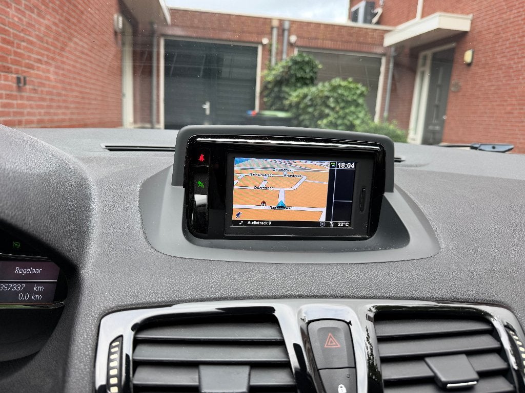Foto 17 van Renault Mégane 1.5 DCI 81KW Estate 2012 met winterbanden