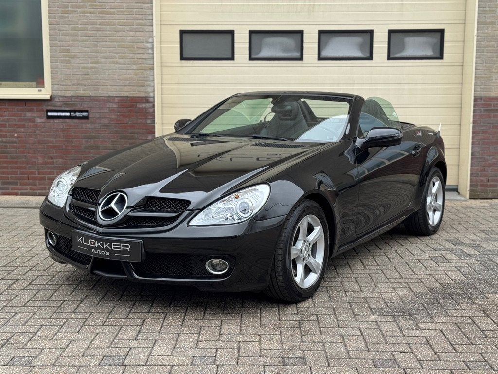 Mercedes-Benz SLK-klasse 200 K. Nek-/stoelverw Dealer ondh., Achterwielaandrijving, Gebruikt, Zwart, 4 cilinders