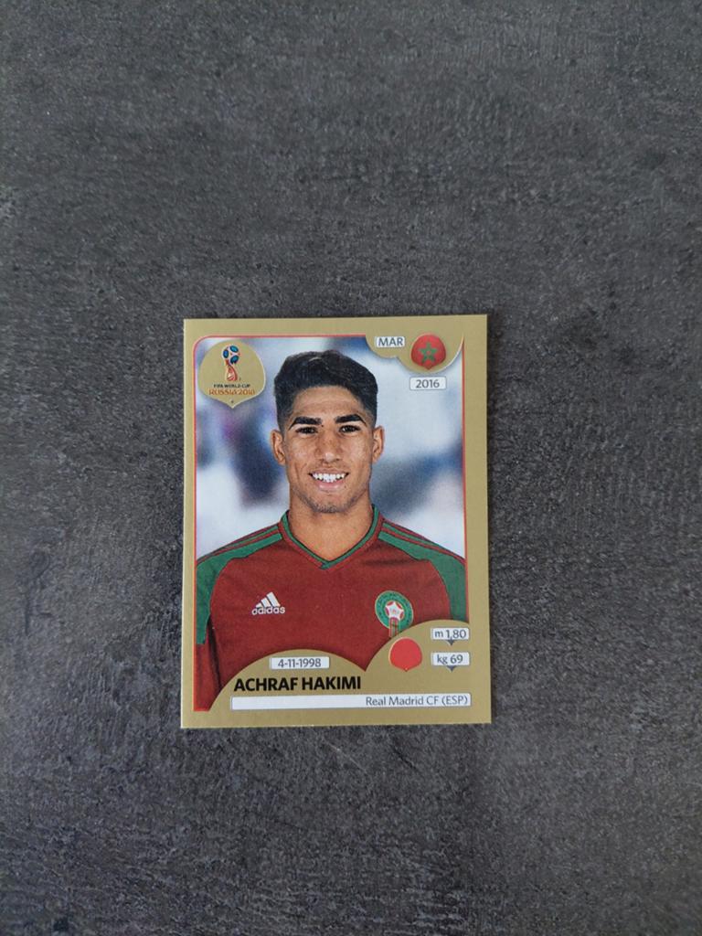 Achraf hakimi ROOKIE (panini wk 2018) gold edition, Ophalen of Verzenden, Nieuw, Buitenlandse clubs, Poster, Plaatje of Sticker