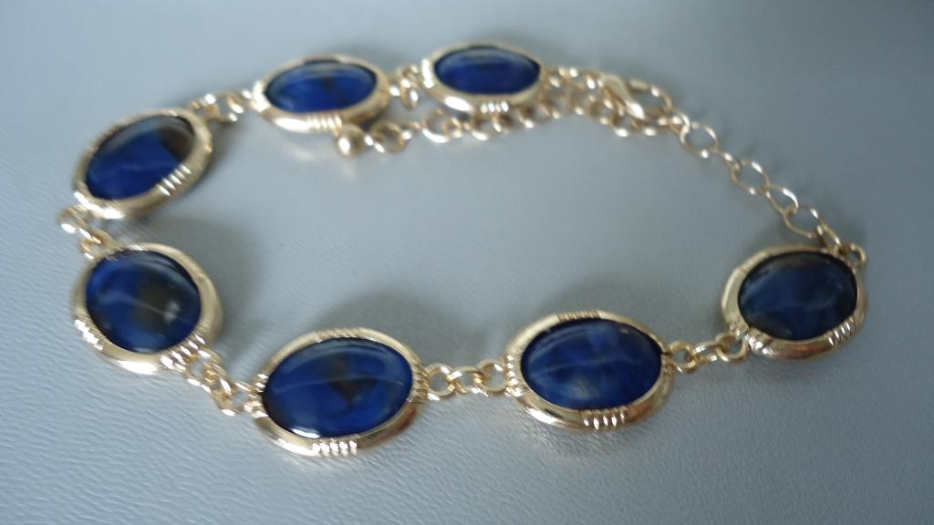 Nieuw goud vergulde armband met 7 blauwe schakels, Sieraden, Tassen en Uiterlijk, Armbanden, Overige materialen, Verzenden, Nieuw