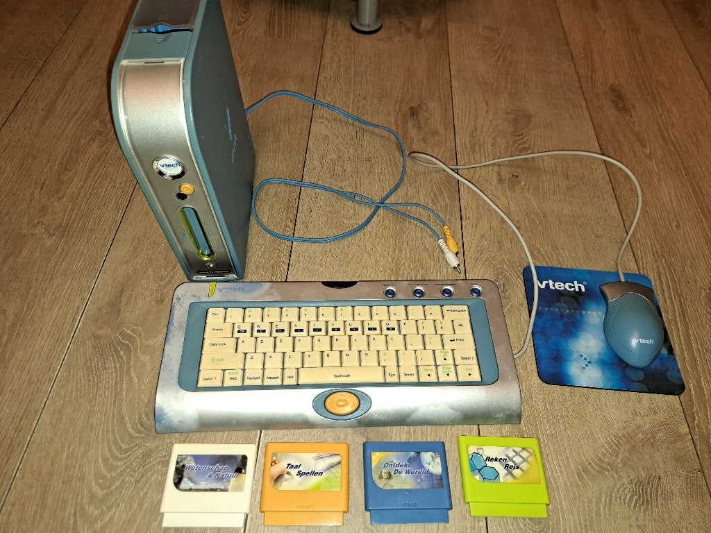 Spelcomputer Vtech genius tv progress met 4 spellen, Kinderen en Baby's, Speelgoed | Vtech, Ophalen of Verzenden, Zo goed als nieuw