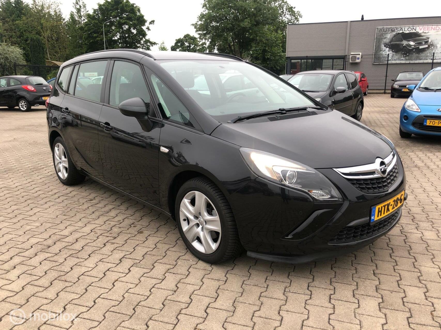 Opel Zafira Tourer 1.4 TURBO 140PK AIRCO CRUISE ELL PAK PDC, Auto's, Voorwielaandrijving, Euro 5, Stof, Zwart