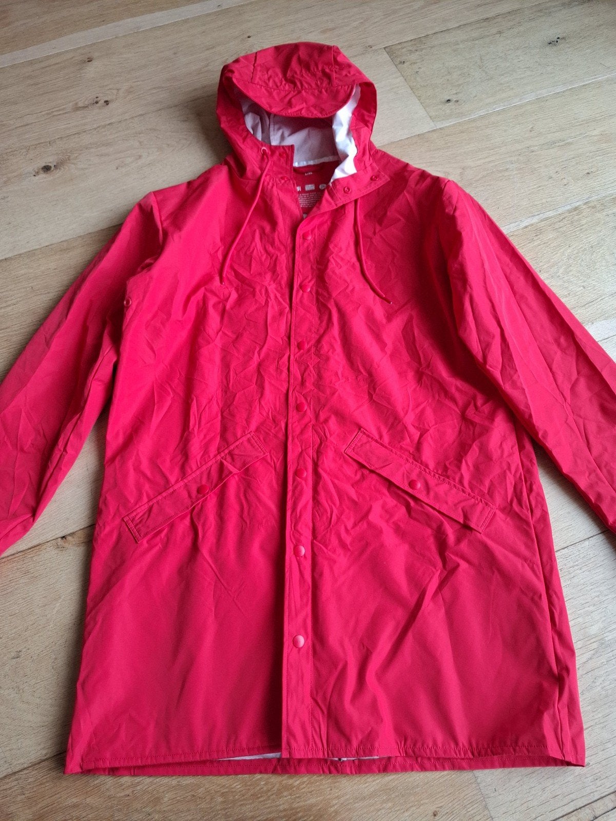 Rode regenjas Postcode Loterij (L/XL), Kleding | Dames, Ophalen of Verzenden, Zo goed als nieuw, Maat 46/48 (XL) of groter, Rood