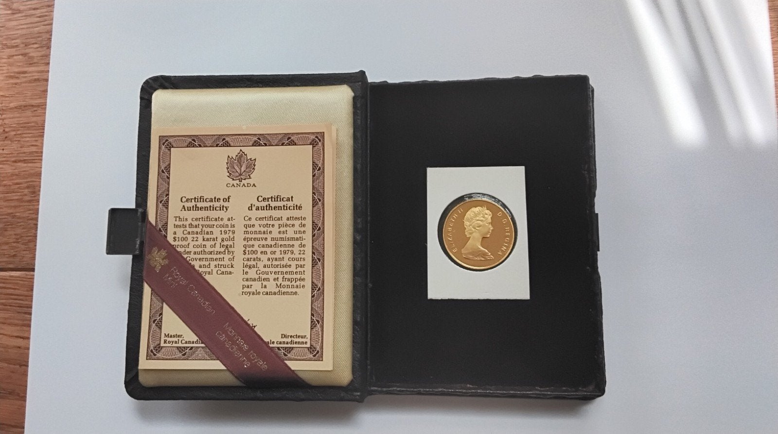 Canadese 100 dollars munt ( 22 karat goud) in cassette., Ophalen of Verzenden, Noord-Amerika, Goud