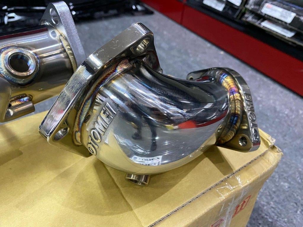 Tomei elbow downpipe - Mitsubishi Lancer Evolution Evo 7 8 9, Ophalen of Verzenden