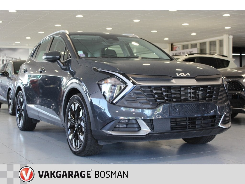 Kia Sportage 1.6 plug-in/CARPLAY/CAMERA/CRUISE (bj 2024), Auto's, Kia, Automaat, Stof, Gebruikt, Zwart