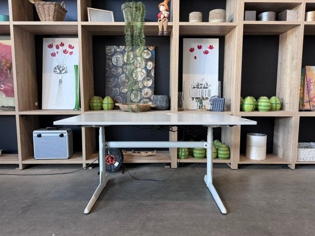Elektrisch Zit-Sta Bureau – 150 x 80 cm – Grijs – €250, 1st