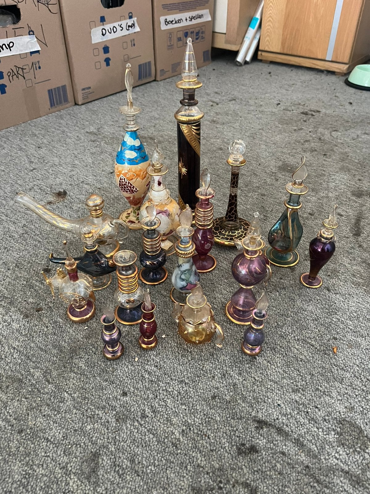 Verzameling Handgeblazen Egyptische glazen parfumflesjes, Ophalen