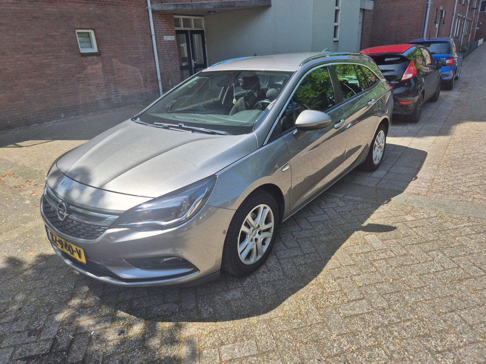 Opel Astra 1.0 Turbo 77KW Sports Tourer 2016 Bruin, Auto's, Voorwielaandrijving, 1178 kg, Bruin, 620 kg