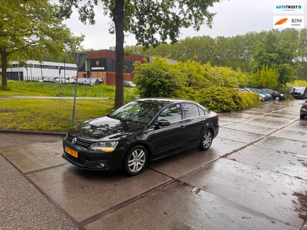 Volkswagen Jetta 1.4 TSI Highline Automaat.Clima.Navi, Euro 5, 4 cilinders, Zwart, Origineel Nederlands