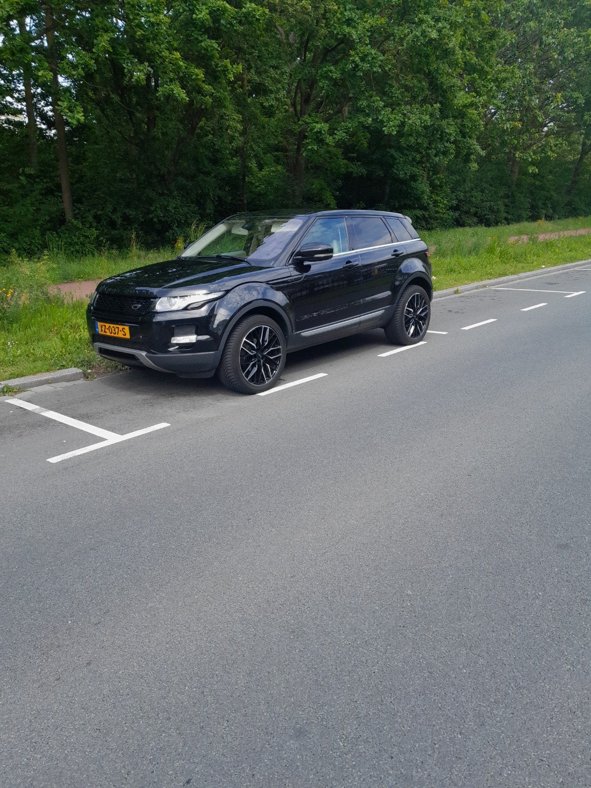 Land Rover Range Rover Evoque SI4 4WD AUT 2012 Zwart NAP., Auto's, Automaat, 1800 kg, 4 cilinders, Zwart
