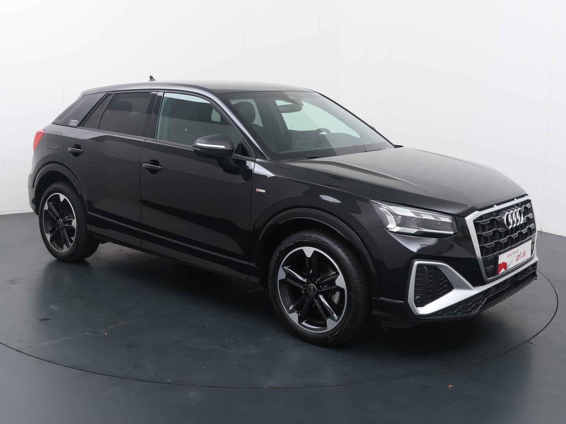 Audi Q2 35 TFSI S Edition | 150 PK | Automaat | Trekhaak | M, Auto's, 12 maanden, 4 cilinders, Leder en Stof, Zwart