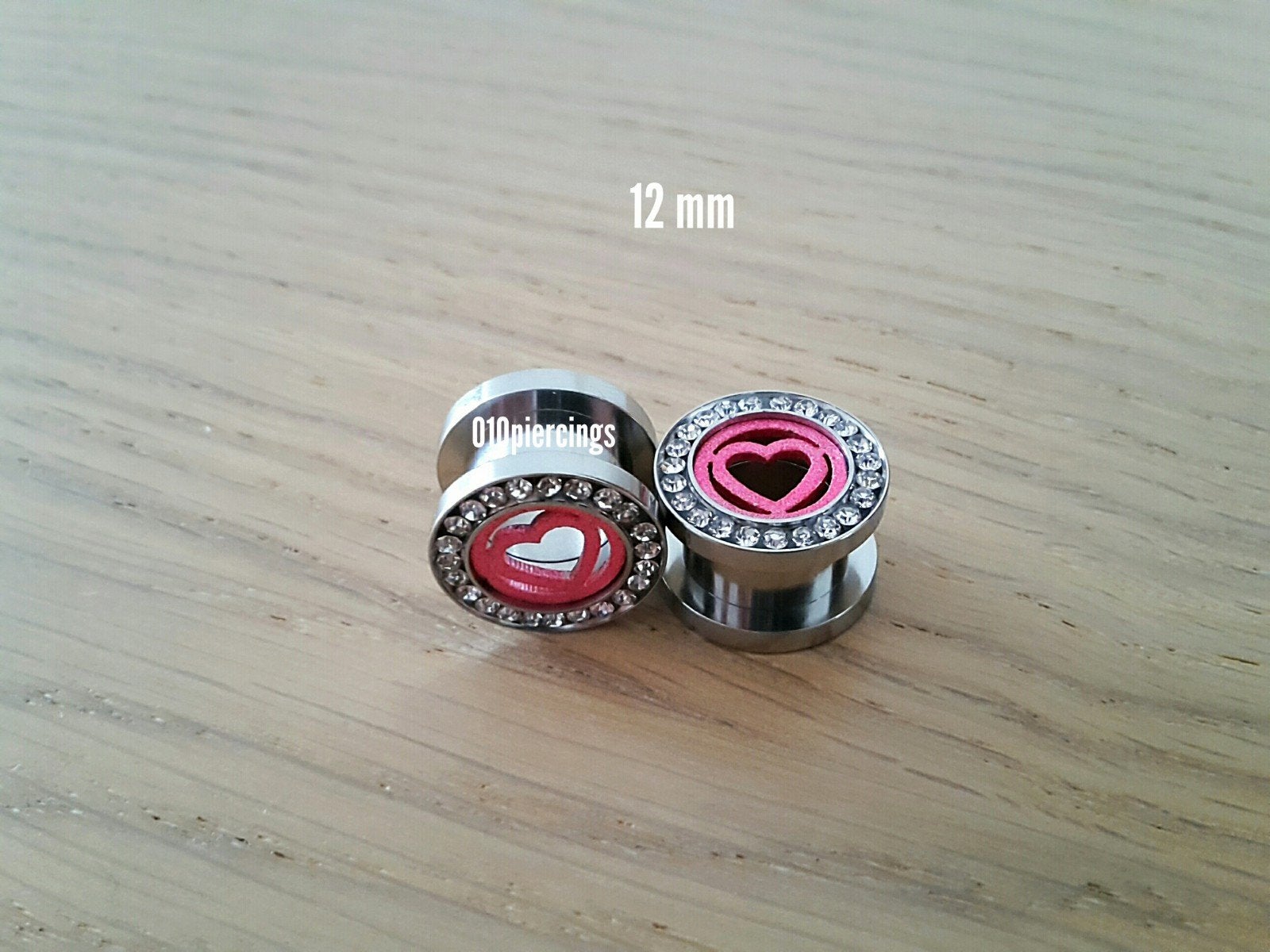 Nieuwe tunnels, pluggen. Staal. Roze hartjes. Steentjes., Ophalen of Verzenden, Zo goed als nieuw, Staal, Oor- of Traguspiercing