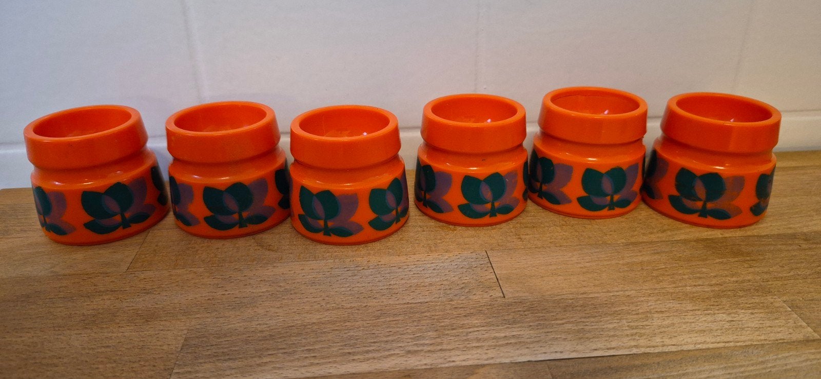 Set van 6 vintage oranje eierdopjes met bladmotief, Ophalen of Verzenden