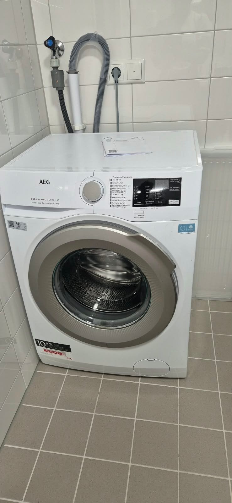 AEG 6000 Series ProSense Wasmachine, Witgoed en Apparatuur, Ophalen, Zo goed als nieuw, 85 tot 90 cm, 1200 tot 1600 toeren