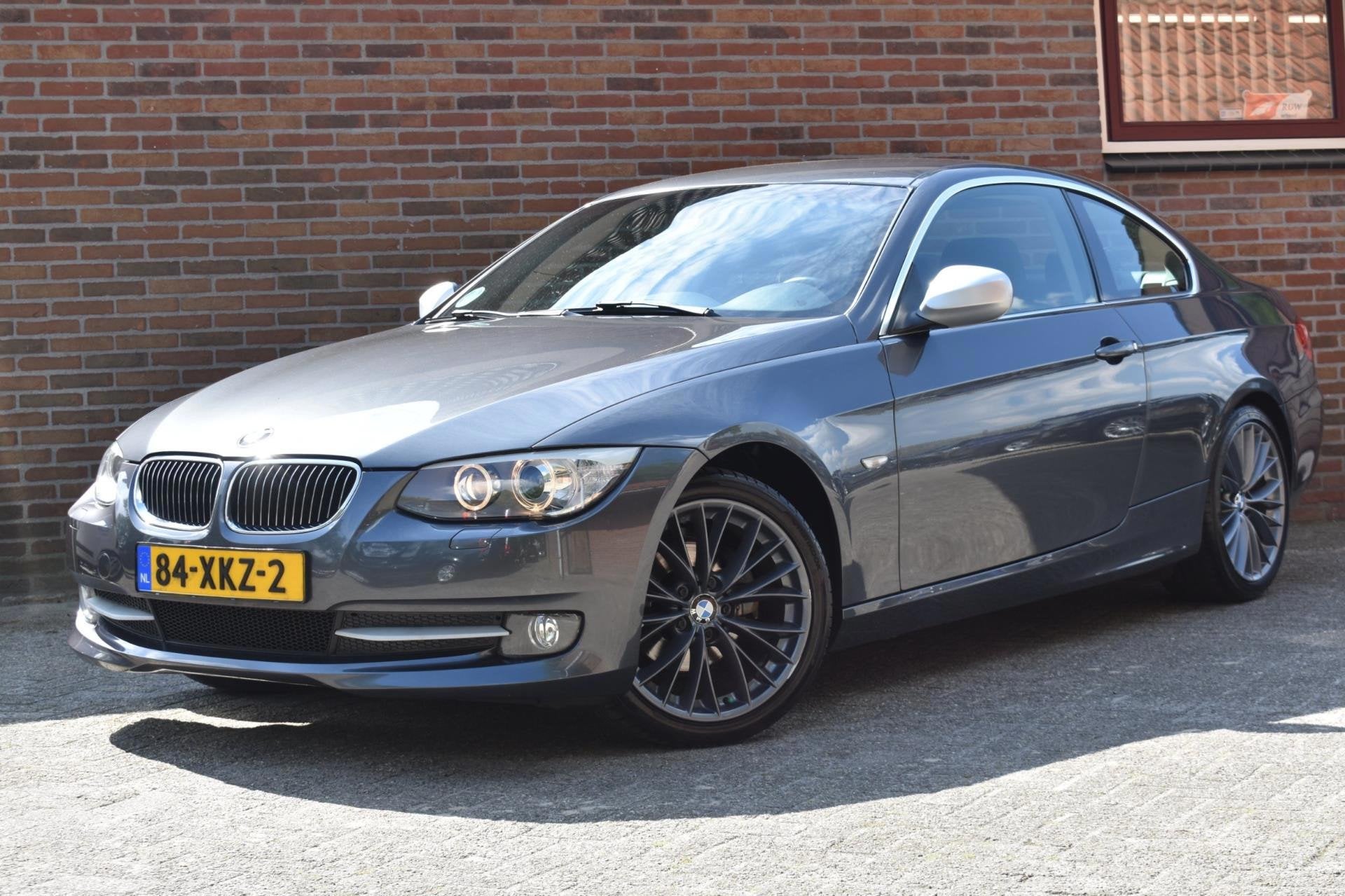 BMW 3-serie Coupé 320i Corporate Lease Mineralgrey Edition, Auto's, BMW, Euro 5, Zwart, 4 cilinders, 4 stoelen