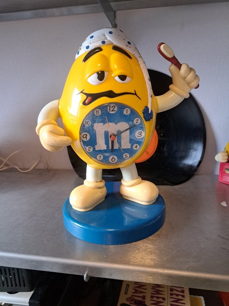 M&M wekker (Z244-38), Ophalen of Verzenden, Gebruikt, Reclamebord
