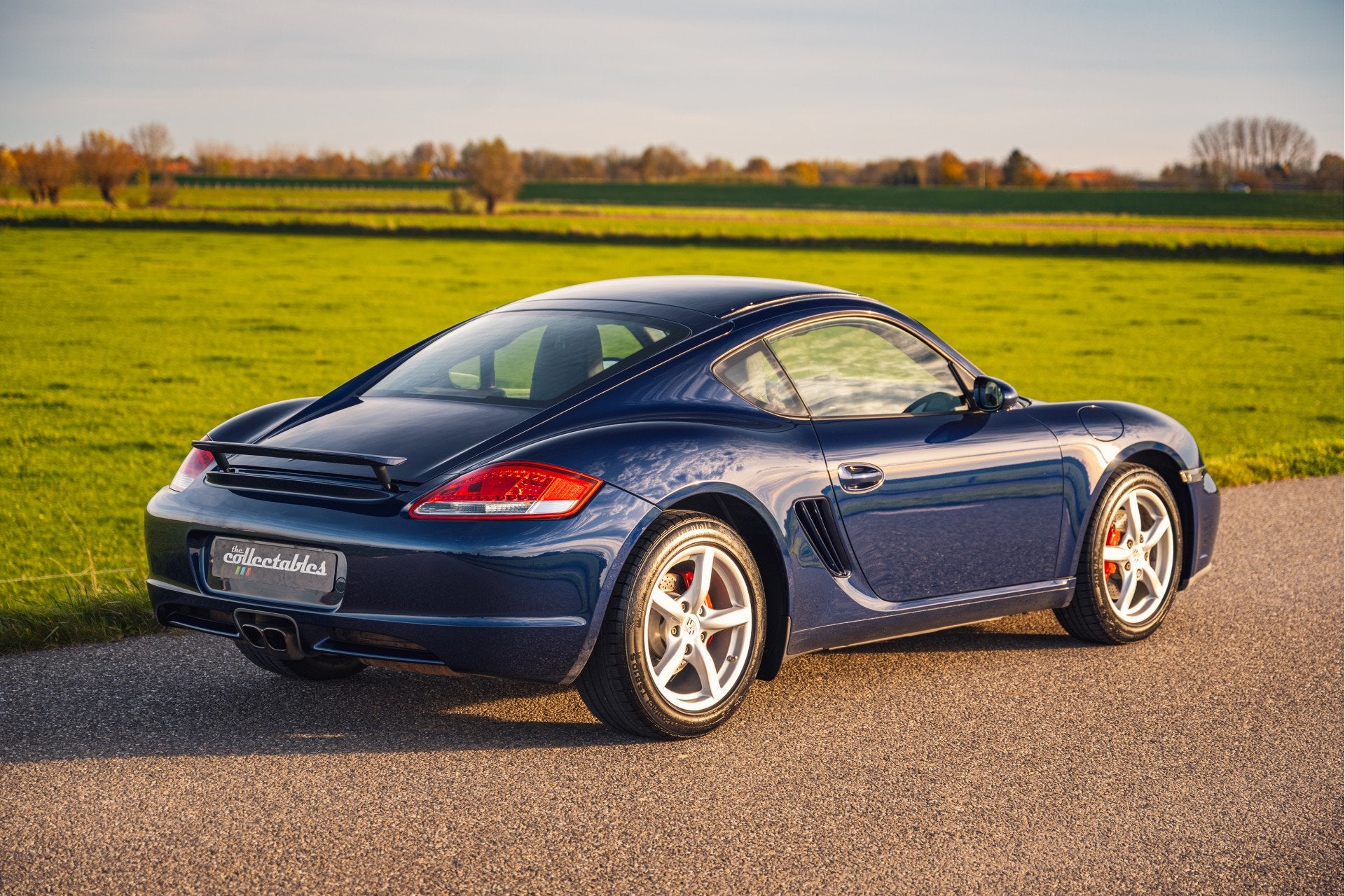 Porsche Cayman S 3.4 handgeschakeld vers gereviseerde motor, Auto's, Achterwielaandrijving, Gebruikt, 296 pk, Blauw