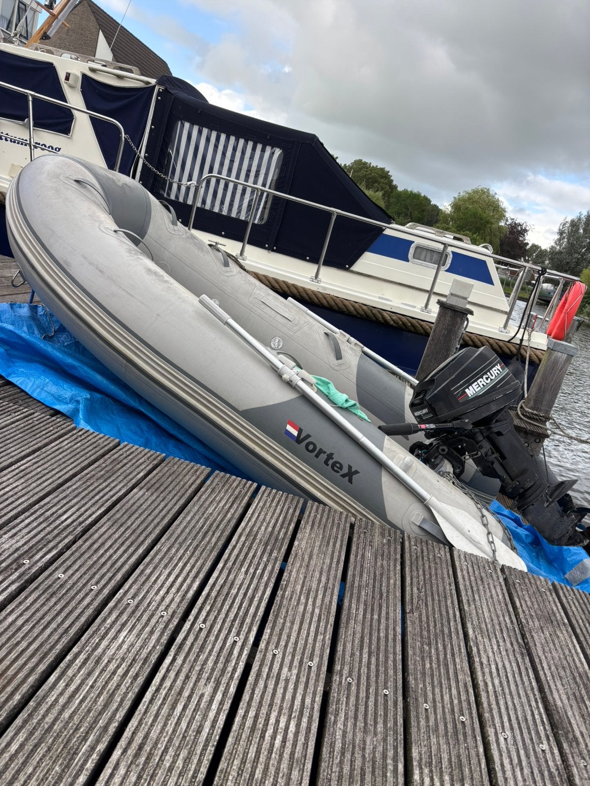 Rubberboot + buitenboordmotor, Ophalen, Mercury